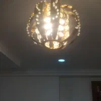 دوتا لوستر با ورق روکش طلایی