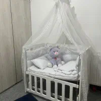 گهواره کنار مادر