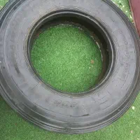 تعدادی لاستیک سواری و کامیون و موتور