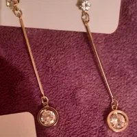 ۲ عدد گوشواره ترک برند تکشتیر و کوتون شیک و مجلسی