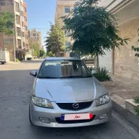 مزدا 323 نقره‌ای مدل 83