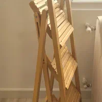 استند چوبی تاشو|کتابخانه، شلف، قفسه‌های دیواری|کرج, شهرک ولیعصر|دیوار