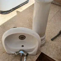 سنگ روشویی همراه با شیرآب
