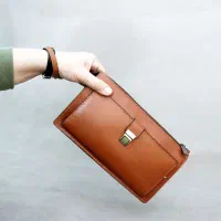 اطلاعیه مفقودی کیف دستی مردانه