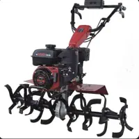 کار با تیلر، شخم زدن باغ در مریوان