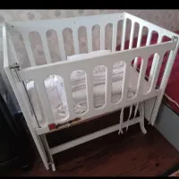 تخت کنار مادر