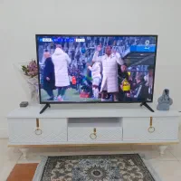 تلویزیون با میز تلویزیون