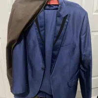 کت شلوار یک بار پوشیده شده