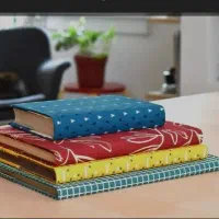 جلد کتاب و دفتر اداری و درسی