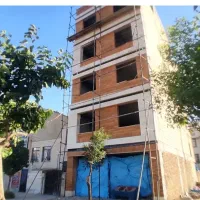 اجرای نما ساختمان آجر و سنگ