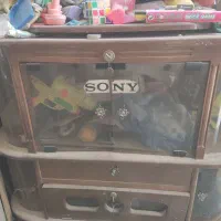 میز تلویزیون به همراه تلویزیون ۲۴ اینچ