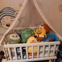 گهواره کنار مادر