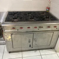 اجاق گاز خورشت پز فردار و یخچال ویترینی مکعبی