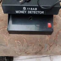 تستر اسکناس تقلبی