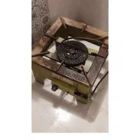 یک عدد جارو برقی مدل Omak و اجاق گاز دو شعله