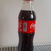 نوشابه یک نفره کوکا کولا مغازه ۲۵ من میدم ۱۵