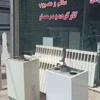 گرمایشی، رادیاتور شوفاژ و پکیج دیواری (خریداری. م)