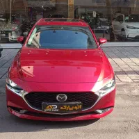 مزدا 3 پرمیوم وارداتی قرمز داخل مشکی ۲۰۲۴