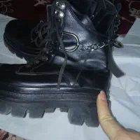 پوتین|کیف، کفش، کمربند|سیلوانه, |دیوار