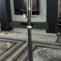 چوپ لباسی فلزی ایستاده