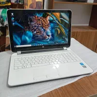 لپ تاپ برند HP سفید با سی پیو i7