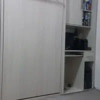 تخت تاشو به همراه میز کامپوتر و تحریر و دوتا کمد