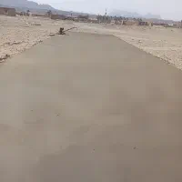 بتن ریزی کف سوله میدان چمنی با خلاطه وماله پروانه