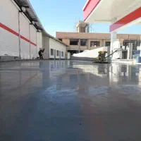 اجرای بتن ریزی کف با دستگاه ماله پروانه ای صاف