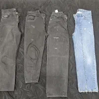 تعدادی شلوار جین