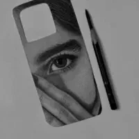 طراحی چشم پشت قاب گوشی و صفحه کتاب هدیه ای خاص|تابلو، نقاشی، عکس|دوگنبدان, |دیوار