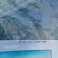 زمین بر جاده بین پمپ بنزین و میدان شهدا دمق