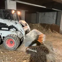 خاکبرداری تخریب بیل لودراستخربابکت نخاله سیمان گچ