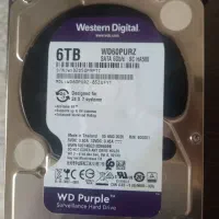 هارد 6 ترابایت وسترن بنفش و دستگاه لمینت تور110
