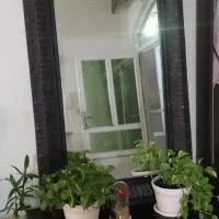 آینه با میز دو عدد شمعدانی