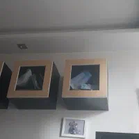 شلف دیواری با جنس ان دی اف و در شیشه ای