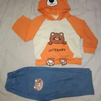 کفش و لباس بچه