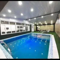 اجاره روزانه باغویلای سالنی ملورین دوخوابه آب گرم