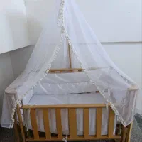 تخت گهواره شو کودک کنار مادر