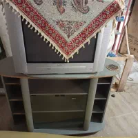 تلویزیون صفحه تخت با کمد