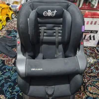 یک عدد صندلی ماشین به همراه یک عدد سه چرخه در حد