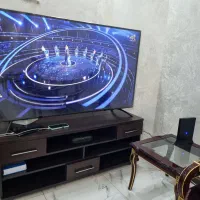 تلوزیون مارشال ۶۵ اینچ با محافظ صفحه و میز