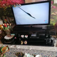 زیر تلویزیونی شیشه ای