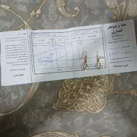مقداری طلا به همراه فاکتور