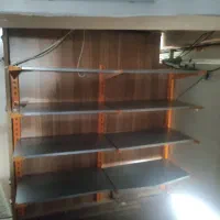 ویترین مغازه بدلیجات و لباس زیر و طبقات فلزی