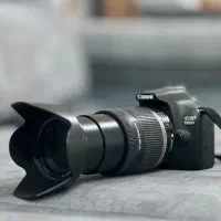 دوربین کنون d1300 همراه با یک لنز ۲۰۰-۱۸