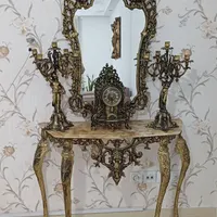 اینه وشمعدان و ساعت در حدنو