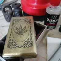 جعبه سیگار فلزی و چوب سیگار و چاقو