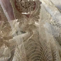 پرده ترک طلایی زربافت گل برجسته