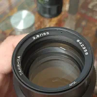 لنزهای تله ۱۳۵میلیمتری و فلاش