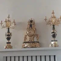 ی جفت ساعت و شمعدان برنزی اصل